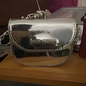 Steve Madden Metallic wristlet.